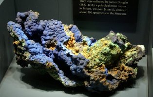 multicolored mineral, primarily blue