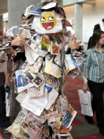 Man dressed in a costume made entirely of newspaper