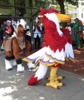 People dressed as horse and a red bird