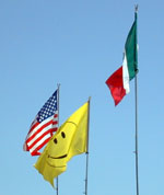 US, smiley face, and Mexican flags