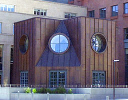 Triangular wood paneled facade