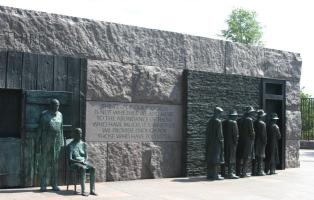 Sculpture of people in bread line during Great Depression