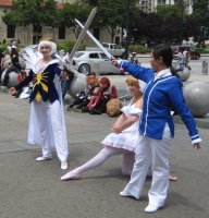 man & woman holding swords crossed, princess in middle