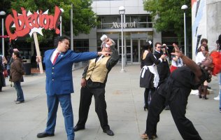 Phoenix Wright shouting 'Objection' at a character with bright red hair