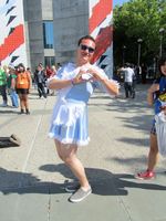 Man in light blue maid outfit
