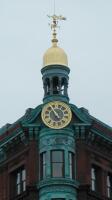 Clock with weathervane