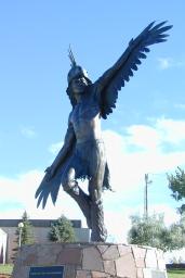 Native American in feathered headdress